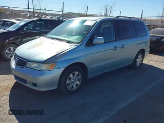 2004 Honda Odyssey EX-L with VIN 5FNRL18944B043710, listed as a IAAI auction lot 41862417 with 380,589 mi miles and . Bid and sale history available at DreamBid. Image 2.