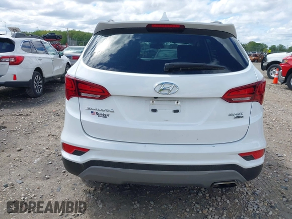 2018 Hyundai Santa Fe 2.4L z VIN 5NMZUDLB1JH101842, wystawiony jako IAAI lot #42302237 z przebiegiem 97 376 mil mil oraz . Historia ofert i sprzedaży dostępna na DreamBid. Obrazek 17.