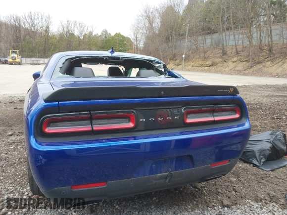 2021 Dodge Challenger R/T Scat Pack Widebody z VIN 2C3CDZFJXMH615361, wystawiony jako IAAI lot #41911374 z przebiegiem 27 159 mil mil oraz . Historia ofert i sprzedaży dostępna na DreamBid. Obrazek 17.
