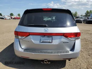 2014 Honda Odyssey Touring with VIN 5FNRL5H91EB502555, listed as a Copart auction lot 61872285 with 203,448 mi miles and Salvage title. Bid and sale history available at DreamBid. Image 6.