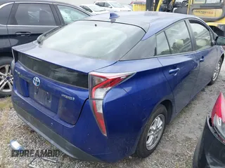 2017 Toyota Prius Two with VIN JTDKBRFU6H3560617, listed as a IAAI auction lot 41935727 with 63,892 mi miles and . Bid and sale history available at carsss.com. Image 4.