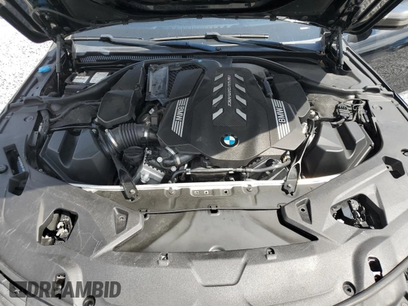 2020 BMW 8 Series M850i z VIN WBAGV8C06LBP48901, wystawiony jako Copart lot #57595725 z przebiegiem 88 332 mil mil oraz Czysty tytuł • Clean title. Historia ofert i sprzedaży dostępna na DreamBid. Obrazek 11.