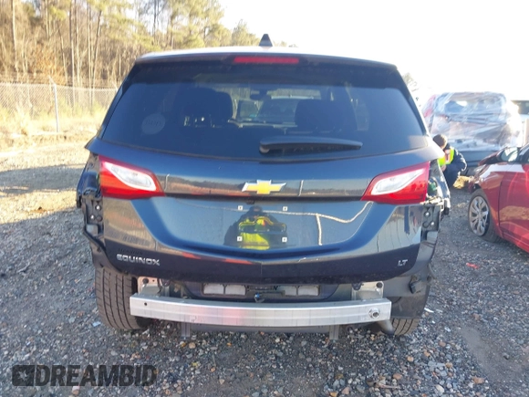 2019 Chevrolet Equinox LT z VIN 3GNAXKEVXKL243487, wystawiony jako IAAI lot #41217077 z przebiegiem 62 119 mil mil oraz . Historia ofert i sprzedaży dostępna na DreamBid. Obrazek 17.