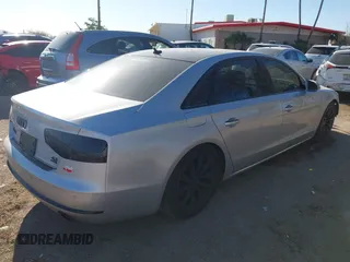 2011 Audi A8 z VIN WAURVAFD4BN020585, wystawiony jako IAAI lot #41841459 z przebiegiem 110 536 mil mil oraz . Historia ofert i sprzedaży dostępna na DreamBid. Obrazek 4.