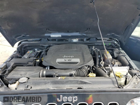 2017 Jeep Wrangler Unlimited Sahara with VIN 1C4BJWEG5HL707569, listed as a Copart auction lot 51326015 with 95,816 mi miles and Salvage title. Bid and sale history available at DreamBid. Image 12.