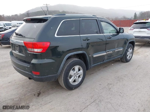2011 Jeep Grand Cherokee Laredo with VIN 1J4RR4GG9BC546198, listed as a IAAI auction lot 41879387 with 190,973 mi miles. Bid and sale history available at carsss.com. Image 4.
