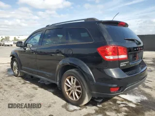 2014 Dodge Journey SXT with VIN 3C4PDCBB5ET198619, listed as a Copart auction lot 54229165 with 167,852 mi miles and Salvage Title. Bid and sale history available at carsss.com. Image 2.