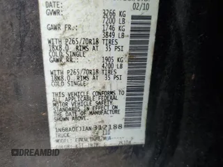 2010 Nissan Titan XE with VIN 1N6BA0EJ1AN312188, listed as a Copart auction lot 50984505 with 391,186 mi miles and Salvage Title. Bid and sale history available at carsss.com. Image 12.