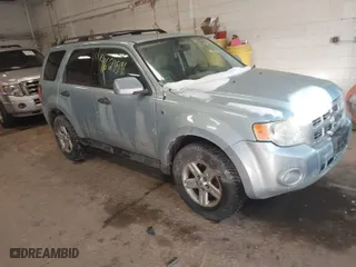 2008 Ford Escape Hybrid with VIN 1FMCU49H58KC63839, listed as a IAAI auction lot 41623596 with 218,566 mi miles. Bid and sale history available at carsss.com. Image 1.
