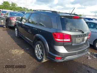 2014 Dodge Journey SXT with VIN 3C4PDCBB3ET172374, listed as a IAAI auction lot 42188228 with 138,129 mi miles. Bid and sale history available at carsss.com. Image 3.
