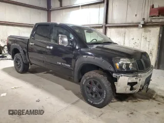 2005 Nissan Titan SE with VIN 1N6BA07B15N559979, listed as a Copart auction lot 81227744 with 175,553 mi miles and Clean Title. Bid and sale history available at DreamBid. Image 4.