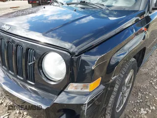 2008 Jeep Patriot Sport with VIN 1J8FF28WX8D775464, listed as a IAAI auction lot 42042232 with 158,428 mi miles and . Bid and sale history available at carsss.com. Image 6.