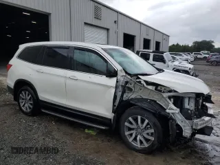 2019 Honda Pilot EX-L with VIN 5FNYF5H46KB039119, listed as a Copart auction lot 69801854 with 48,470 mi miles and Salvage title. Bid and sale history available at DreamBid. Image 4.