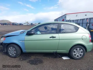 2008 Hyundai Accent GS with VIN KMHCM36C28U064545, listed as a IAAI auction lot 41958102 with 120,679 mi miles. Bid and sale history available at carsss.com. Image 14.