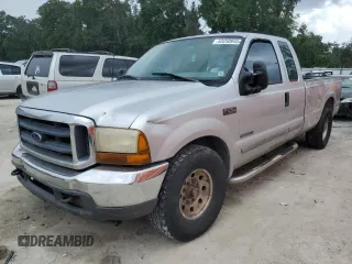 2001 Ford F-250 XL with VIN 1FTNX20F61EB23095, listed as a Copart auction lot 63250945 with 458,658 mi miles and Salvage title. Bid and sale history available at DreamBid. Image 1.