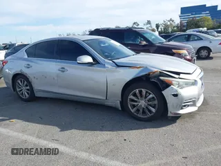 2014 Infiniti Q50 Sport with VIN JN1BV7AP9EM674097, listed as a IAAI auction lot 41741697 with 105,797 mi miles and . Bid and sale history available at DreamBid. Image 13.