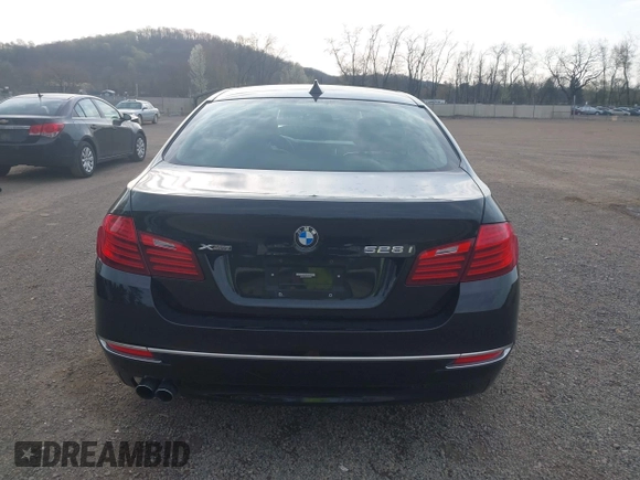 2014 BMW 5 Series 528i xDrive with VIN WBA5A7C52ED616976, listed as a IAAI auction lot 42067334 with 98,286 mi miles and . Bid and sale history available at DreamBid. Image 16.