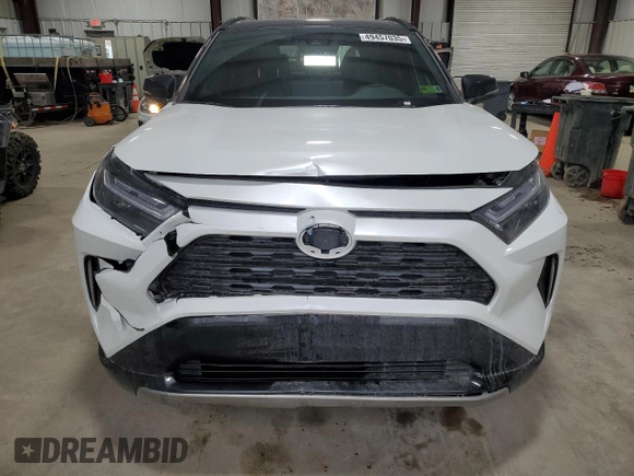 2024 Toyota RAV4 Hybrid XSE with VIN 2T3E6RFV8RW082127, listed as a Copart auction lot 49457035 with 5,544 mi miles and Salvage Title. Bid and sale history available at DreamBid. Image 5.