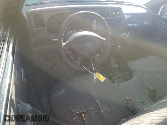 1998 Nissan Frontier XE z VIN 1N6DD21S1WC340005, wystawiony jako Copart lot #83630474 z przebiegiem 164 423 mil mil oraz Szkoda całkowita • Salvage title. Historia ofert i sprzedaży dostępna na DreamBid. Obrazek 8.