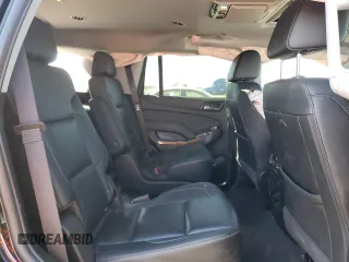 2019 Chevrolet Tahoe Premier with VIN 1GNSKCKJ4KR406220, listed as a Copart auction lot 50491344 with 37,254 mi miles and Salvage title. Bid and sale history available at DreamBid. Image 12.