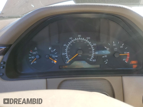 1998 Mercedes-Benz E 320 with VIN WDBJF25FXWA549962, listed as a Copart auction lot 87876005 with 303,884 mi miles and Salvage Title. Bid and sale history available at DreamBid. Image 9.