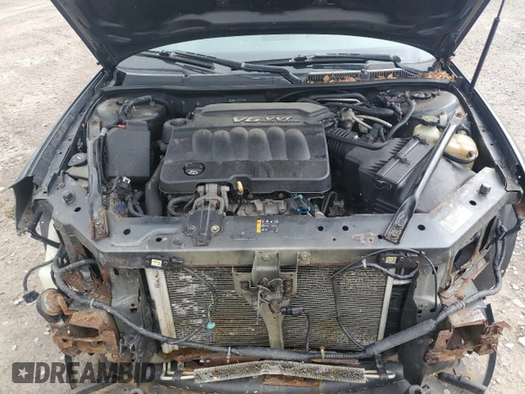 2014 Chevrolet Impala LT z VIN 2G1WB5E31E1102318, wystawiony jako Copart lot #61552845 z przebiegiem 191 365 mil mil oraz Szkoda całkowita • Salvage title. Historia ofert i sprzedaży dostępna na DreamBid. Obrazek 11.