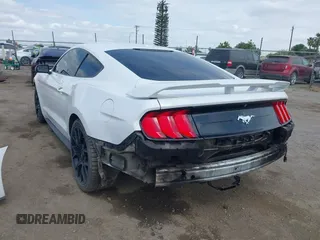 2019 Ford Mustang EcoBoost with VIN 1FA6P8THXK5143703, listed as a IAAI auction lot 42056207 with 71,251 mi miles and . Bid and sale history available at carsss.com. Image 3.
