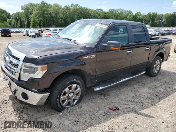 2014 Ford F-150 XL with VIN 1FTFW1EF4EKD49721, listed as a Copart auction lot 61695615 with 217,493 mi miles and Salvage title. Bid and sale history available at DreamBid. Image 1.