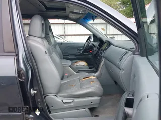2005 Honda Pilot EX-L with VIN 5FNYF18565B046464, listed as a IAAI auction lot 41879495 with 228,021 mi miles. Bid and sale history available at carsss.com. Image 5.