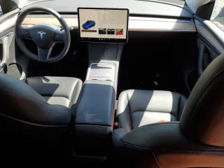 2023 Tesla Model Y Long Range with VIN 7SAYGDEE3PA106609, listed as a Copart auction lot 53839315 with 24,077 mi miles and Salvage Title. Bid and sale history available at DreamBid. Image 8.