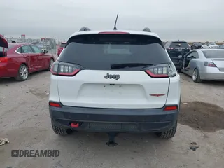 2019 Jeep Cherokee Trailhawk with VIN 1C4PJMBN6KD124023, listed as a IAAI auction lot 41432217 with 76,934 mi miles and . Bid and sale history available at DreamBid. Image 17.