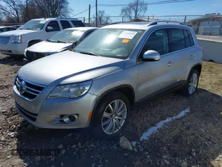 2011 Volkswagen Tiguan SE with VIN WVGBV7AX9BW509353, listed as a IAAI auction lot 41645315 with 112,283 mi miles and . Bid and sale history available at DreamBid. Image 2.