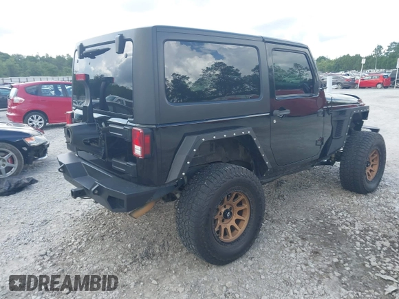 2012 Jeep Wrangler Sport z VIN 1C4AJWAG2CL286680, wystawiony jako IAAI lot #42434411 z przebiegiem 97 142 mil mil oraz . Historia ofert i sprzedaży dostępna na DreamBid. Obrazek 4.