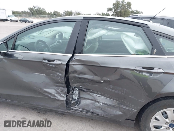 2019 Ford Fusion S with VIN 3FA6P0G79KR215541, listed as a IAAI auction lot 41626638 with 73,751 mi miles and . Bid and sale history available at DreamBid. Image 14.