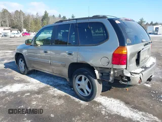2002 GMC Envoy SLT with VIN 1GKDT13S822154592, listed as a IAAI auction lot 41389285 with 153,897 mi miles. Bid and sale history available at carsss.com. Image 3.