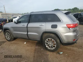 2014 Jeep Grand Cherokee Limited with VIN 1C4RJFBG8EC496303, listed as a Copart auction lot 56215195 with 129,269 mi miles and Salvage Title. Bid and sale history available at DreamBid. Image 2.