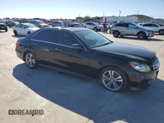 2014 Mercedes-Benz E 400 Sport with VIN WDDHF9FB2EA832266, listed as a Copart auction lot 43920075 with 56,524 mi miles and Salvage Title. Bid and sale history available at DreamBid. Image 4.
