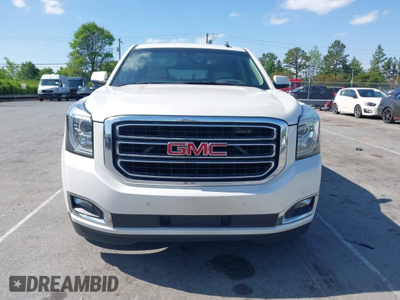 2015 GMC Yukon Denali with VIN 1GKS1CKJ3FR230797, listed as a IAAI auction lot 41977294 with 174,633 mi miles. Bid and sale history available at carsss.com. Image 12.