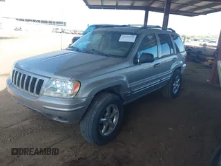 2002 Jeep Grand Cherokee Limited with VIN 1J8GW58J62C165942, listed as a IAAI auction lot 42739339 with 220,677 mi miles and . Bid and sale history available at DreamBid. Image 2.