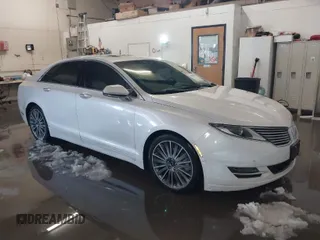 2014 Lincoln MKZ with VIN 3LN6L2J92ER836146, listed as a IAAI auction lot 41583343 with 130,613 mi miles. Bid and sale history available at carsss.com. Image 1.