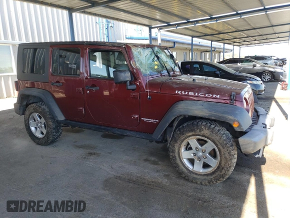 2010 Jeep Wrangler Unlimited Rubicon with VIN 1J4BA6H18AL197855, listed as a Copart auction lot 57748185 with 147,899 mi miles and Salvage title. Bid and sale history available at DreamBid. Image 4.
