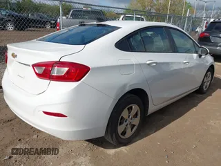 2018 Chevrolet Cruze LS with VIN 1G1BC5SM6J7134204, listed as a IAAI auction lot 42162533 with 96,914 mi miles and . Bid and sale history available at DreamBid. Image 4.