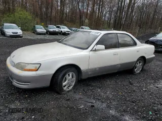 1995 Lexus ES with VIN JT8GK13T9S0094112, listed as a Copart auction lot 51773295 with 304,643 mi miles and Salvage Title. Bid and sale history available at carsss.com. Image 1.