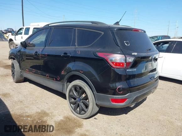 2018 Ford Escape SE z VIN 1FMCU9GD3JUC75754, wystawiony jako IAAI lot #41761965 z przebiegiem 101 771 mil mil oraz . Historia ofert i sprzedaży dostępna na DreamBid. Obrazek 3.