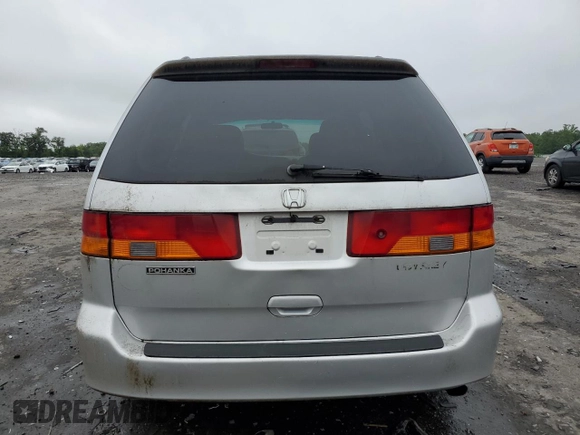 2003 Honda Odyssey EX z VIN 5FNRL18603B008148, wystawiony jako Copart lot #60669825 z przebiegiem 128 115 mil mil oraz Czysty tytuł • Clean title. Historia ofert i sprzedaży dostępna na DreamBid. Obrazek 6.