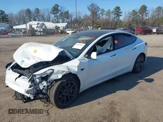 2022 Tesla Model 3 with VIN 5YJ3E1EA5NF315004, listed as a IAAI auction lot 41429800 with Not Provided miles. Bid and sale history available at carsss.com. Image 6.