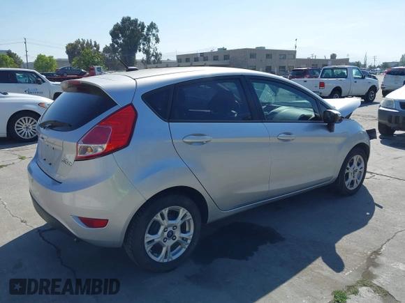 2014 Ford Fiesta SE with VIN 3FADP4EJ8EM121567, listed as a IAAI auction lot 42229439 with 108,640 mi miles and . Bid and sale history available at DreamBid. Image 4.