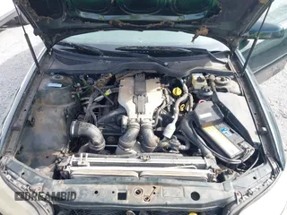 2000 Cadillac Catera z VIN W06VR54R0YR002664, wystawiony jako IAAI lot #41857553 z przebiegiem 86 354 mil mil oraz . Historia ofert i sprzedaży dostępna na DreamBid. Obrazek 10.