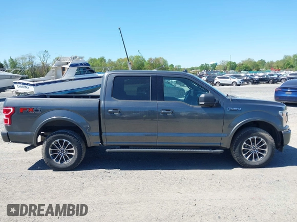 2018 Ford F-150 XL with VIN 1FTEW1EG2JFE55513, listed as a IAAI auction lot 41530354 with 132,617 mi miles. Bid and sale history available at carsss.com. Image 13.