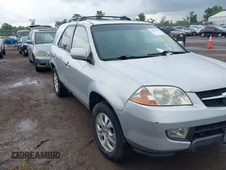 2003 Acura MDX Touring with VIN 2HNYD18603H516424, listed as a IAAI auction lot 42531381 with 201,971 mi miles and . Bid and sale history available at DreamBid. Image 1.